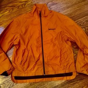 Timberland’s Men’s stylish orange windbreaker, medium size